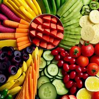 Create a colorful and appealing image of healthy snack options in the form of a fruit and vegetable platter.