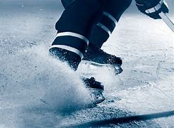 Image result for Hockey Skates On-Ice Stock Image