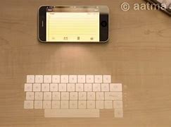 Image result for iPhone 5 Holographic Keyboard