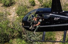 Image result for Helicopter Hog Hunting Texas