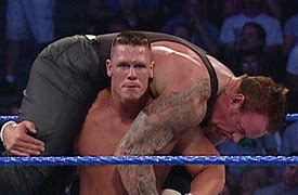 Image result for WWE Videos John Cena vs Undertaker