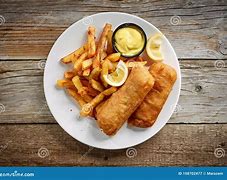 Image result for Cooked Fish On a Plate with Chips
