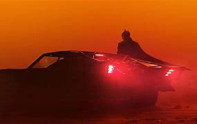Image result for Robert Pattinson Batman Red Race Car