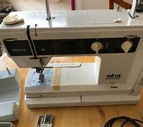 Image result for Elna Carina Sewing Machine