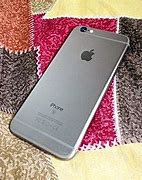 Image result for iPhone 6 Space Gray in Hand