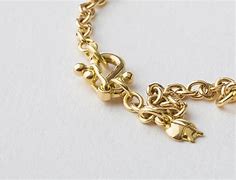 Image result for 18k Gold Charm Bracelet with Engraving