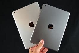 Image result for Silver vs Space Grey iPad Mini 4