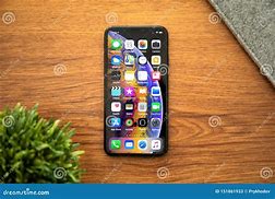 Image result for Apple with iPhone On Table