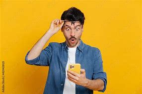 Image result for Unsplash Free Images of a Man Holding Phone