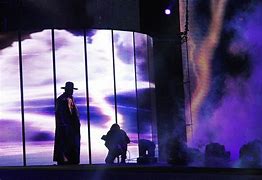 Image result for WWE Undertaker Chokeslam