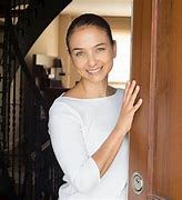 Image result for A Woman Answering a Door