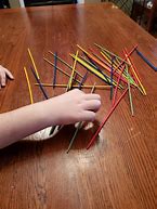 Image result for How to Play Pick Up Sticks Game