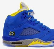 Image result for Blue and Yellow Jordan 5s