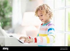 Image result for Picture of Kid Playing Song On His Computer