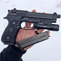 Image result for Beretta M9 Tactical