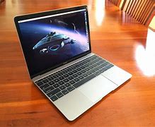 Image result for Apple Laptop Box with Apple Laptop On It