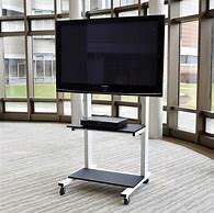 Image result for 55-Inch TV Stand On Wheels White