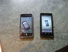 Image result for Droid DNA vs iPhone 5