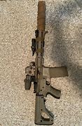 Image result for AR-15 with Suppressor
