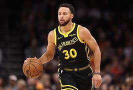 Image result for Steph Curry San Francisco Jersey Dribbling