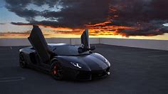superdeportivo Lamborghini Aventador, sobre las azoteas, cielo rojo, nubes Fondos de pantalla | 1920x1080 Full HD Fondos de descarga