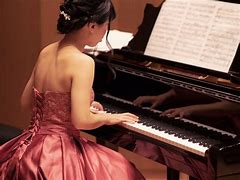Image result for Beautiful Woman Playing Piano