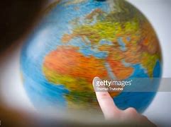 Image result for Globe Spinning On a Finger
