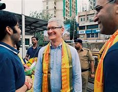 Image result for Tim Cook in India with Tika