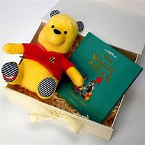 Image result for Winnie the Pooh Holding a Present