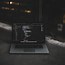 Image result for Image of a Laptop and Coding On Table