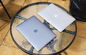 Image result for McBook Space Grey vs Silver