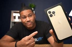 Image result for iPhone 13 Pro Gold in Hand