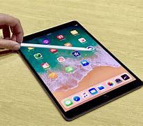Image result for Apple iPad and Pen