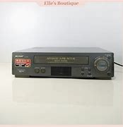 Image result for System Multi Sharp VHS Multiplayer Player