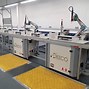 Image result for Automated Robotics Sticker Assembly
