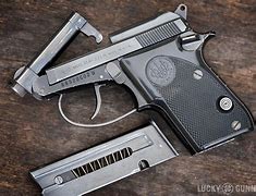Image result for Compact Top Loading Gun