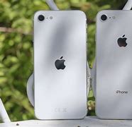 Image result for Someone Holding a iPhone 2020 SE