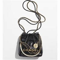 Image result for Black and Gold Chanel Bag