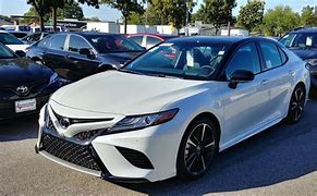 Image result for Toyota Camry White with Black Roof