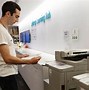 Image result for Person Operating Printer