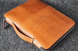 Image result for iPad Escada Leather Carrying Case