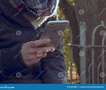Image result for Person On Phone in Nature