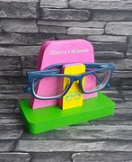 Image result for Superhero Eyeglass Holder Stand