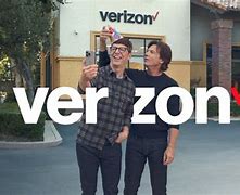 Image result for Verizon iPhone 15 Pro Christmas Caroling Commercial