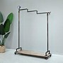 Image result for Industrial Clothing Rack with Shelves