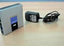 Image result for Ata Adapter Linksys