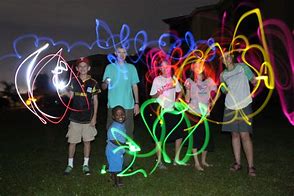Image result for Girls in Glow Sticks
