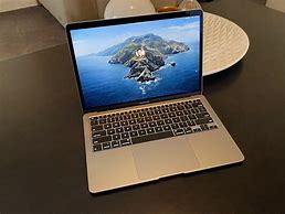 Image result for Orange Apple Laptop