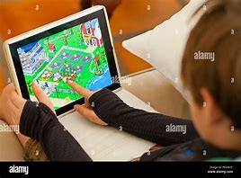 Image result for Kid Playing Games On iPad