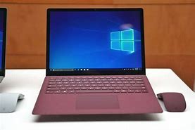 Image result for Microsoft Red Laptop